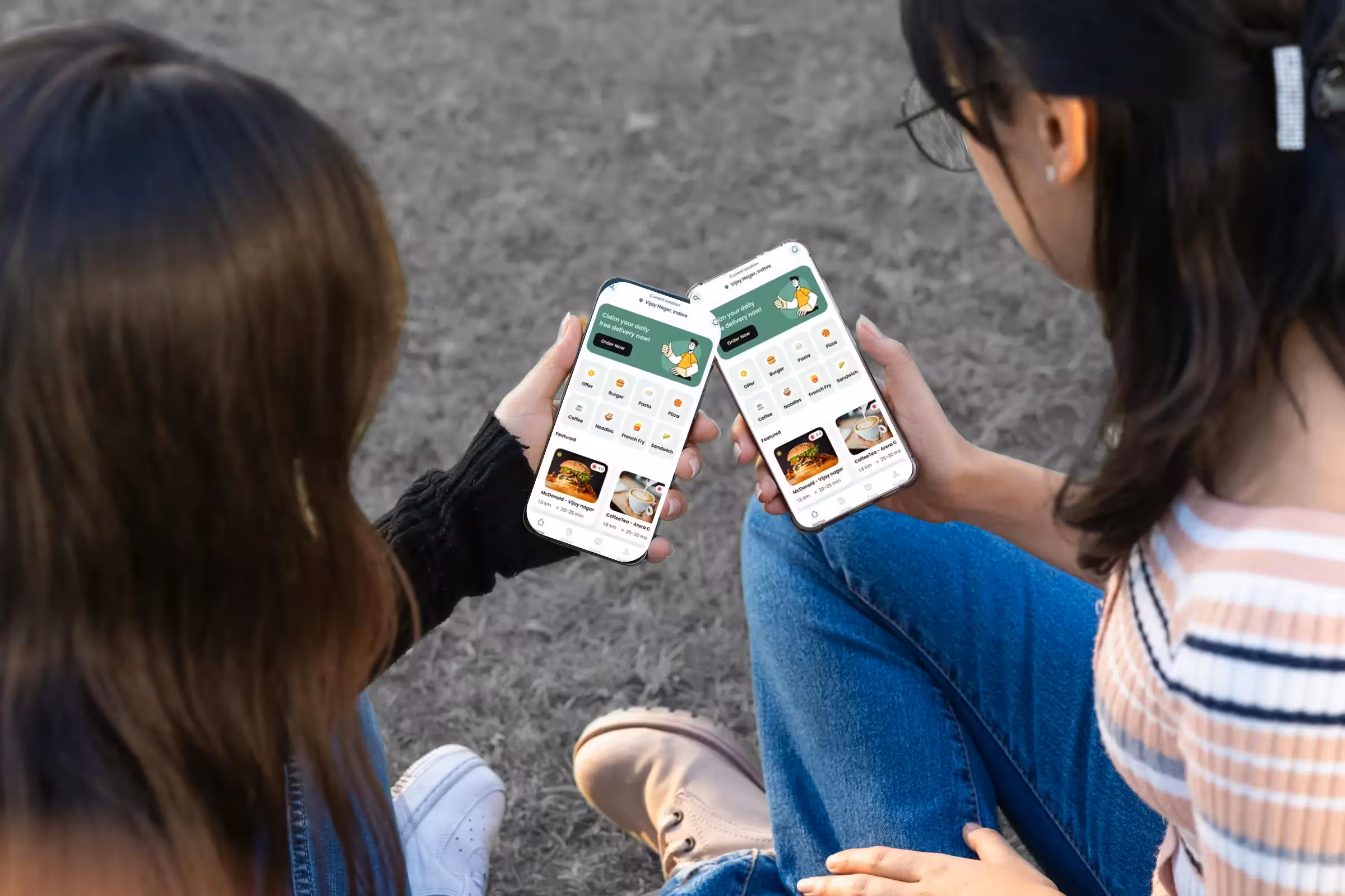 A food-ordering mobile app being viewed simultaneously on an iPhone and android mobile phone.